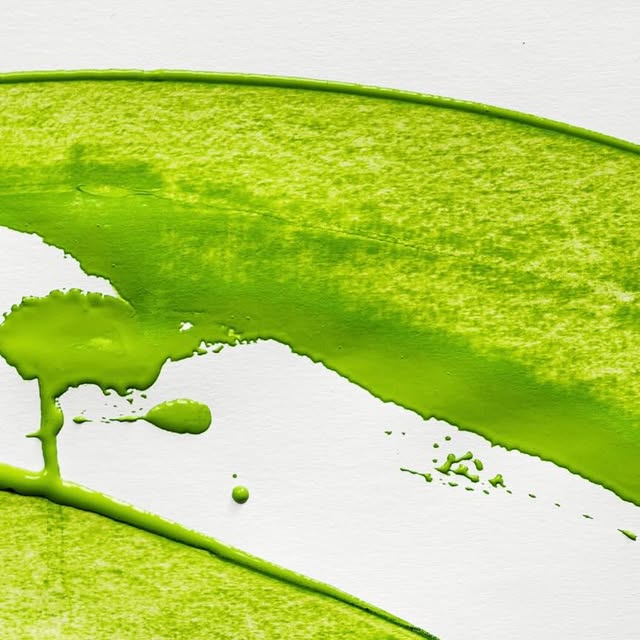 Matcha brushstroke on white
